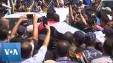 Thousands Bury Police Officers Killed in Rare Gaza Attacks