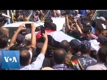 Thousands Bury Police Officers Killed in Rare Gaza Attacks