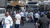 Palestinian shooting at Jerusalem bus stop kills 6, injures 12