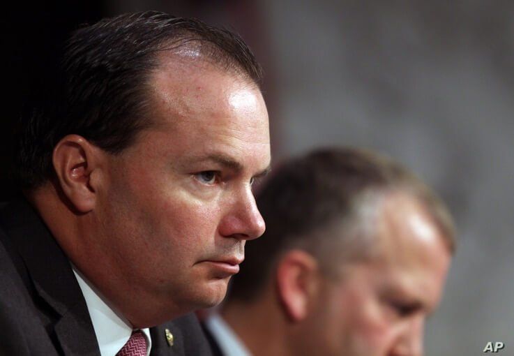 Sen. Mike Lee, R-Utah, listens during a Senate Armed Services Committee on Capitol Hill in Washington, July 21, 2015 . 