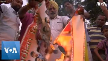 Indian Cricket Fans Burn Posters in Reaction to World Cup Loss