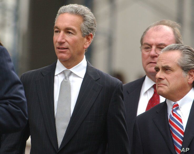 FILE - Charles Kushner, left, walks to the U.S. District Courthouse with his lawyers Benjamin Brafman, right, and Alfred C. DeCotiis, center, in Newark, N.J., Aug. 18, 2004. 