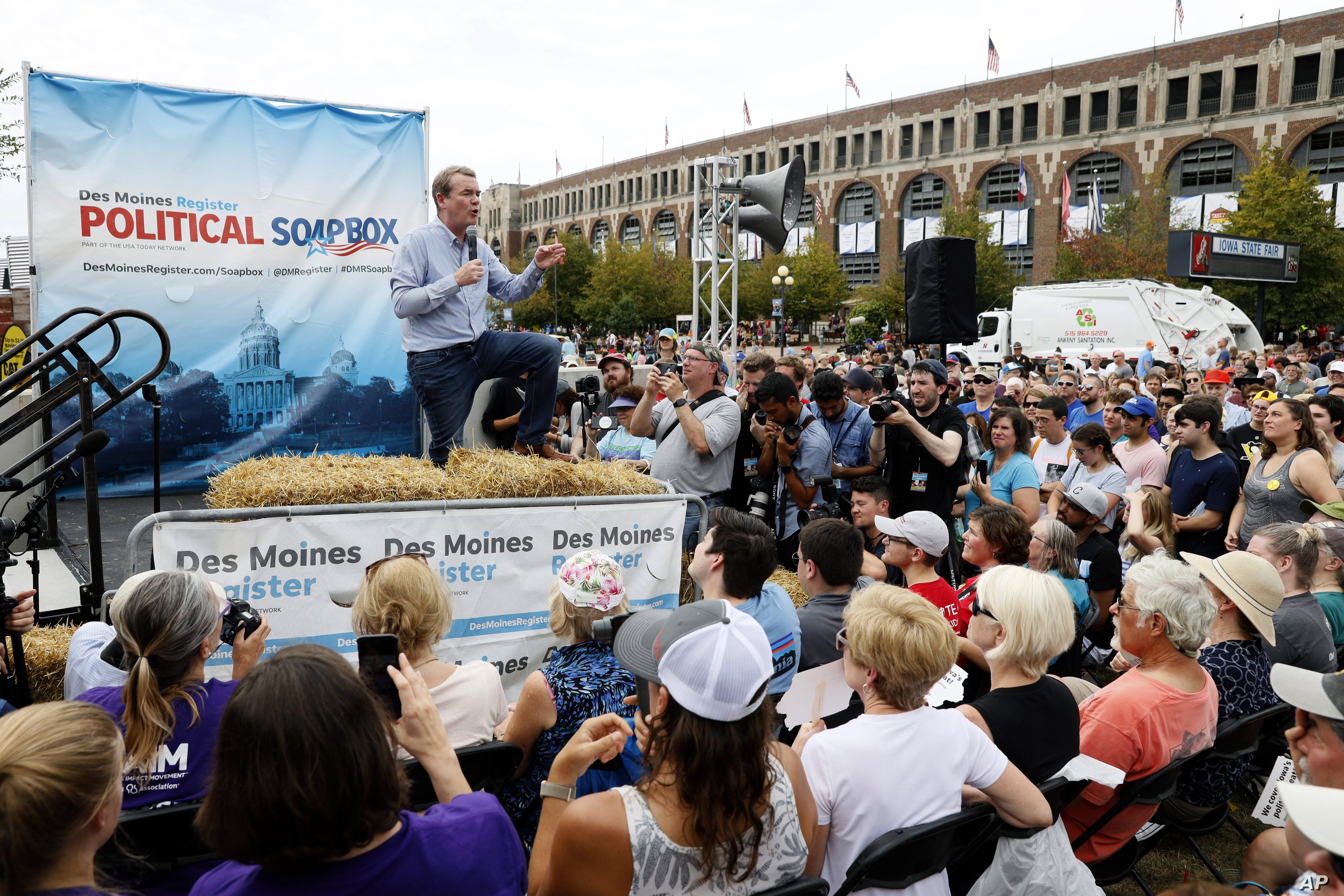 Democratic presidential candidate Sen. Michael Bennet speaks at the Des Moines Register Soapbox during a visit to the Iowa State Fair, Aug. 11, 2019, in Des Moines, Iowa.