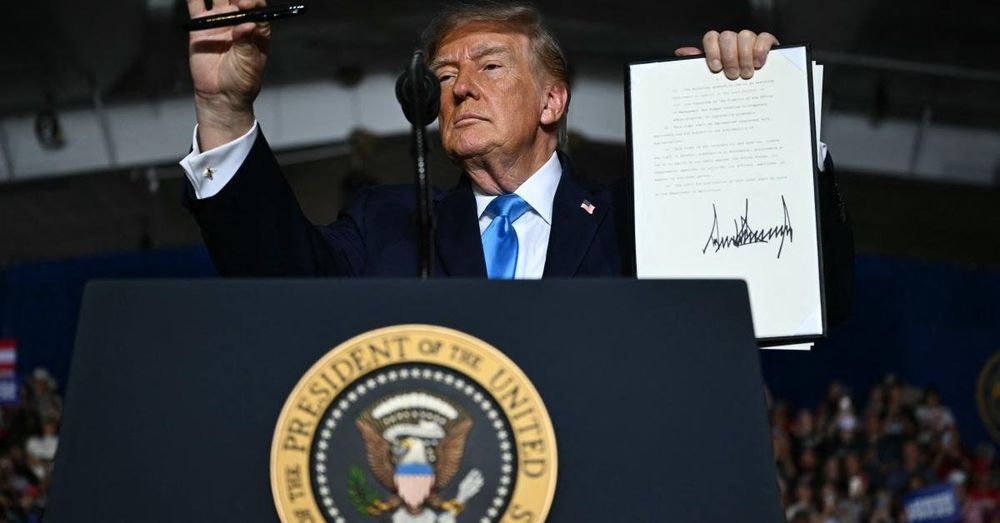 President Donald Trump signs executive order to bring down diesel costs during Nebraska rally