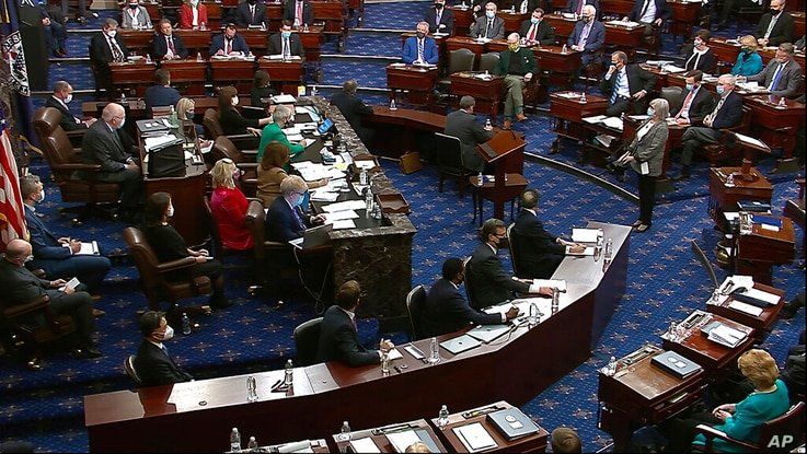 In this image from video, senators vote during the second impeachment trial of former President Donald Trump in the Senate at…