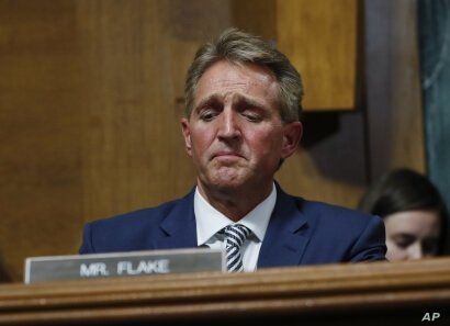 Sen. Jeff Flake speaks during the Senate Judiciary Committee hearing about Brett Kavanaugh's nomination for the Supreme Court. After a flurry of last-minute negotiations, the committee advanced Kavanaugh after agreeing to a call from Flake for a one 