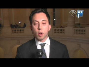 NY Rep. threatens to throw reporter off balcony