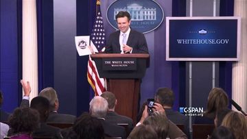 Royals Fan/White House Press Secretary with Mets logo (C-SPAN)