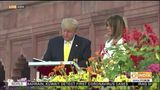 US President Donald Trump writes in the visitor’s book at Taj Mahal