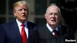 FILE - U.S. President Donald Trump listens as Justice Anthony Kennedy speaks before swearing in Judge Neil Gorsuch as an Associate Supreme Court Justice at the White House in Washington, April 10, 2017.