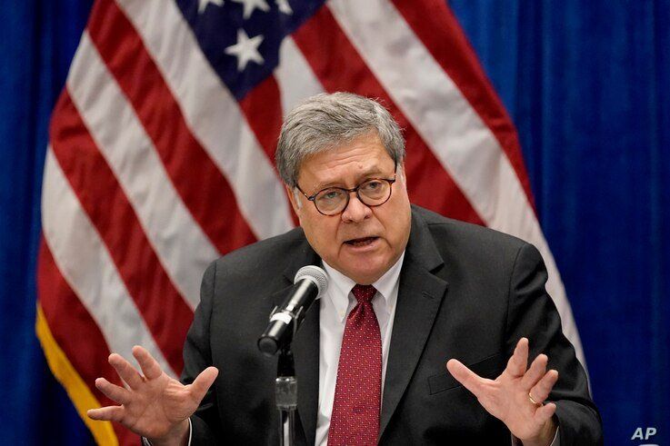 FILE - In this Oct. 15, 2020, file photo, Attorney General William Barr speaks during a roundtable discussion on Operation…