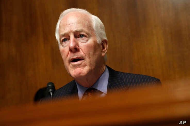 FILE - Senate Majority Whip Sen. John Cornyn, R-Texas, Chair of the Senate Judiciary Border Security and Immigration Subcommittee, speaks during a hearing about the border, May 8, 2019, on Capitol Hill in Washington.