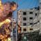 Israeli airstrikes level buildings in Gaza amid regional conflict