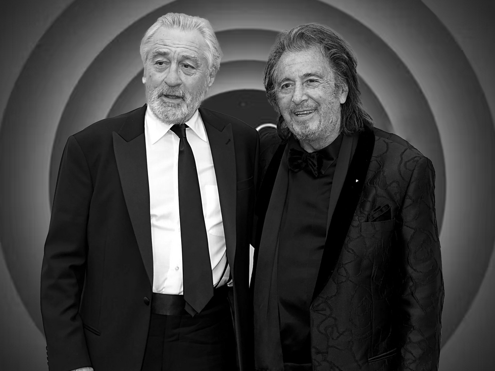 NO SATISFACTION WITH STONE AGE CELEBRITIES JAGGER AND DE NIRO