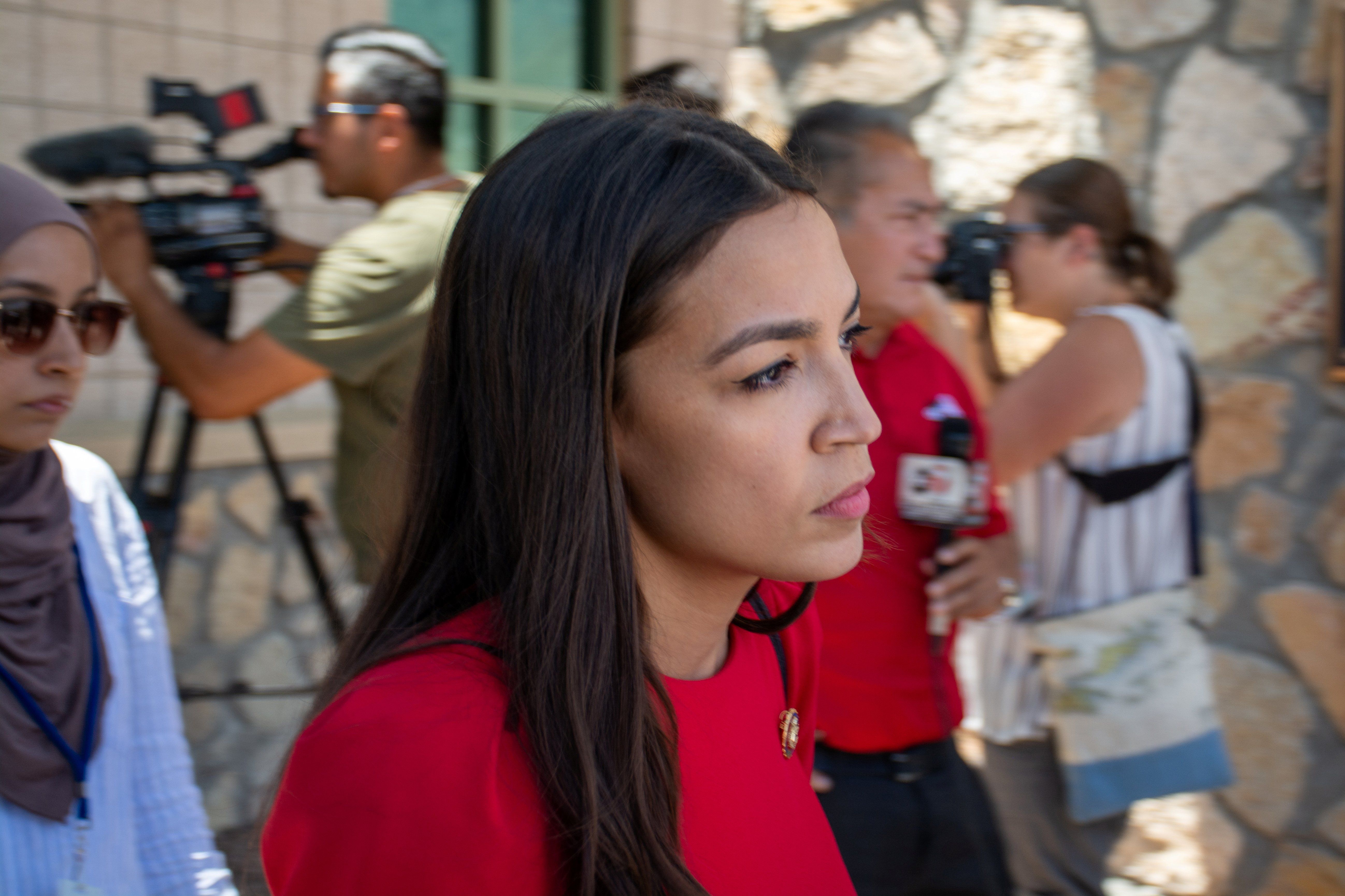 U.S. Representative Alexandria Ocasio-Cortez leaves the El Paso border patrol station during a tour of two facilities with other members of Congress in El Paso, Texas, July 1, 2019. 