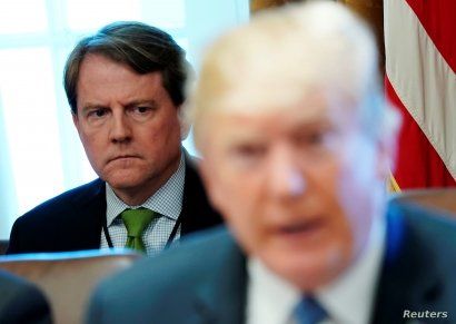 White House Counsel Don McGahn sits behind U.S. President Donald Trump as the president holds a cabinet meeting at the White House in Washington, U.S. June 21, 2018.