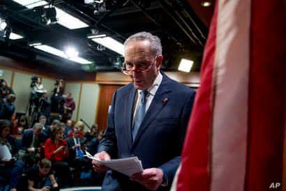 Senate Minority Leader Sen. Chuck Schumer of N.Y. leaves after speaking at a news conference, Monday, Dec. 16, 2019, on Capitol…