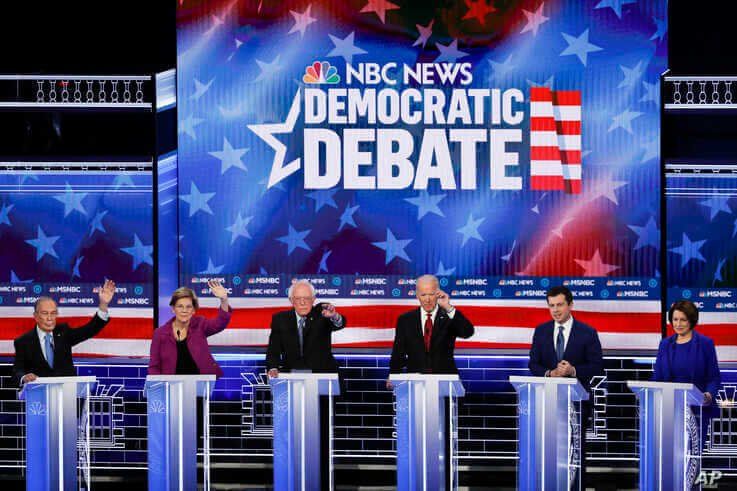 From left, Democratic presidential candidates, former New York City Mayor Mike Bloomberg, Sen. Elizabeth Warren, D-Mass., Sen…