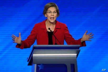 Democratic presidential candidate Elizabeth Warren speaks during a Democratic presidential primary debate at Saint Anselm College in Manchester, New Hampshire, Feb. 7, 2020. 