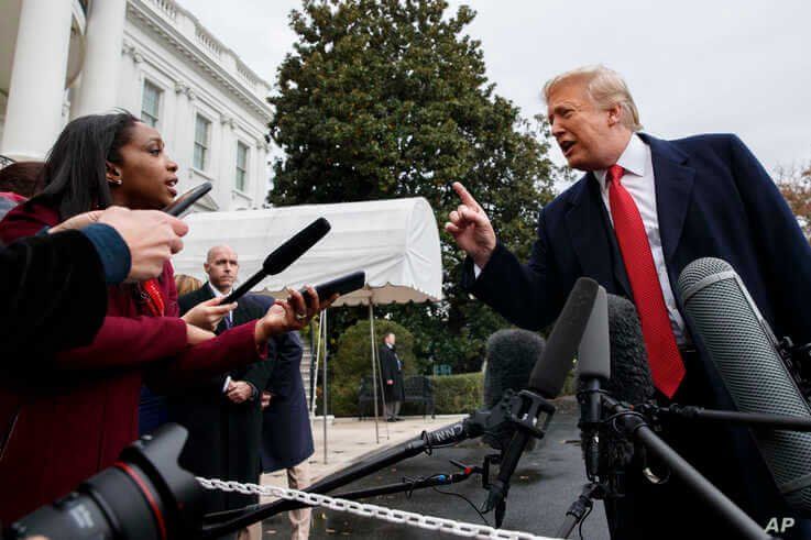 CNN journalist Abby Phillip asks President Donald Trump a question as he speaks with reporters before departing for France on…