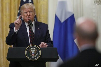President Donald Trump speaks during a news conference with and Finnish President Sauli Niinisto (not pictured) at the White House in Washington, Oct. 2, 2019. 