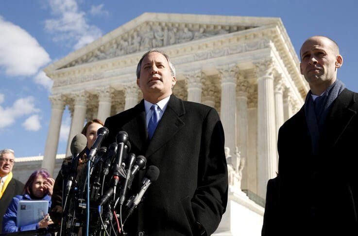 FILE PHOTO: Texas Attorney General Ken Paxton addresses reporters on the steps of the U.S. Supreme Court in Washington