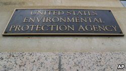 FILE - A marker on the outside of the Environmental Protection Agency building in Washington.