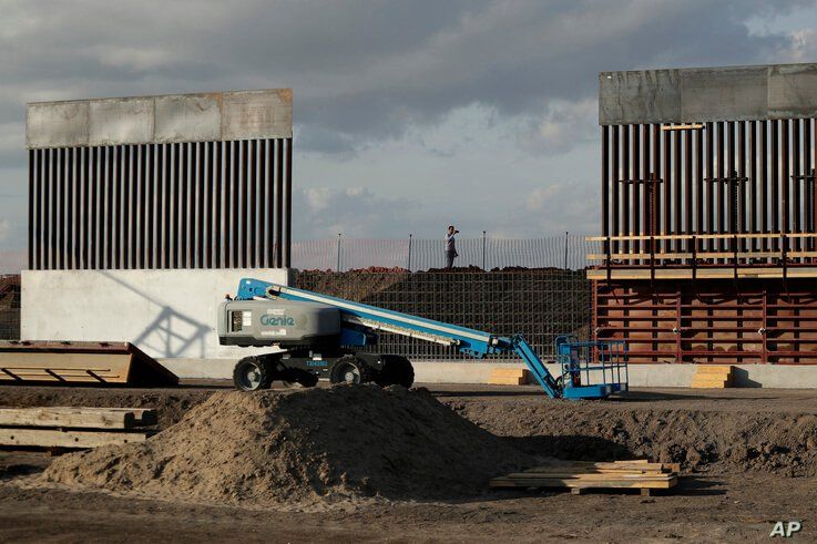 The first panels of levee border wall are seen at a construction site along the U.S.-Mexico border, Thursday, Nov. 7, 2019, in…