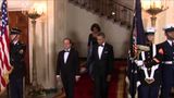 Obamas warm up to Hollande at state dinner