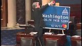 Sen. Tom Coburn cuts up giant credit card on the Senate floor