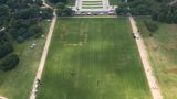 Pattern on National Mall grass appears to show '8647,' numbers associated with threats to Trump