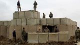 Inspector general for Afghan reconstruction says 20 year effort is marked by 'too many failures'