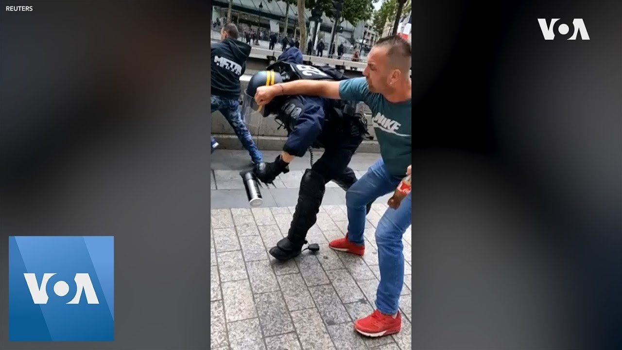 Police Officer Punched to Ground After Bastille Day Parade in France