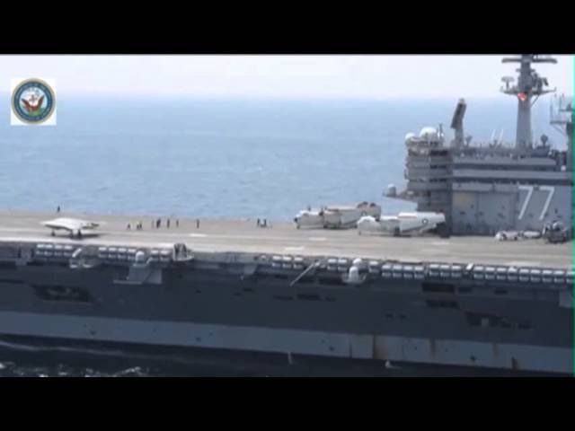 Raw: Navy completes 1st unmanned carrier landing