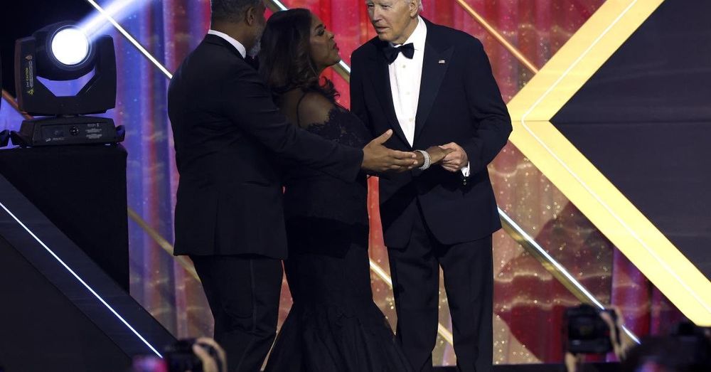 Rep. Terri Sewell pulls away from Biden as he leans in to greet her at CBC awards dinner