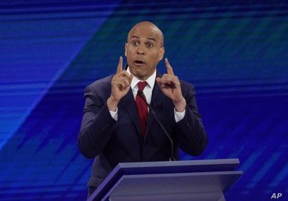 Sen. Cory Booker, D-N.J., responds to a question Thursday, Sept. 12, 2019, during a Democratic presidential primary debate hosted by ABC at Texas Southern University in Houston. (AP Photo/David J. Phillip)