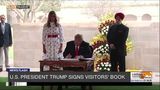 President Trump signs visitor’s book at Raj Ghat