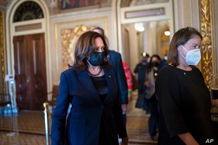 Vice President Kamala Harris arrives to break the tie on a procedural vote as the Senate works on the Democrats' $1.9 trillion…