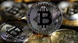 Bitcoin continues rapid slide, drops 12% to nearly $18,000 amid economic turmoil