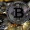 Bitcoin continues rapid slide, drops 12% to nearly $18,000 amid economic turmoil