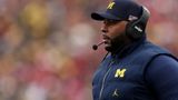 Prosecutors claim ex-University of Michigan football coach threatened suicide during home invasion