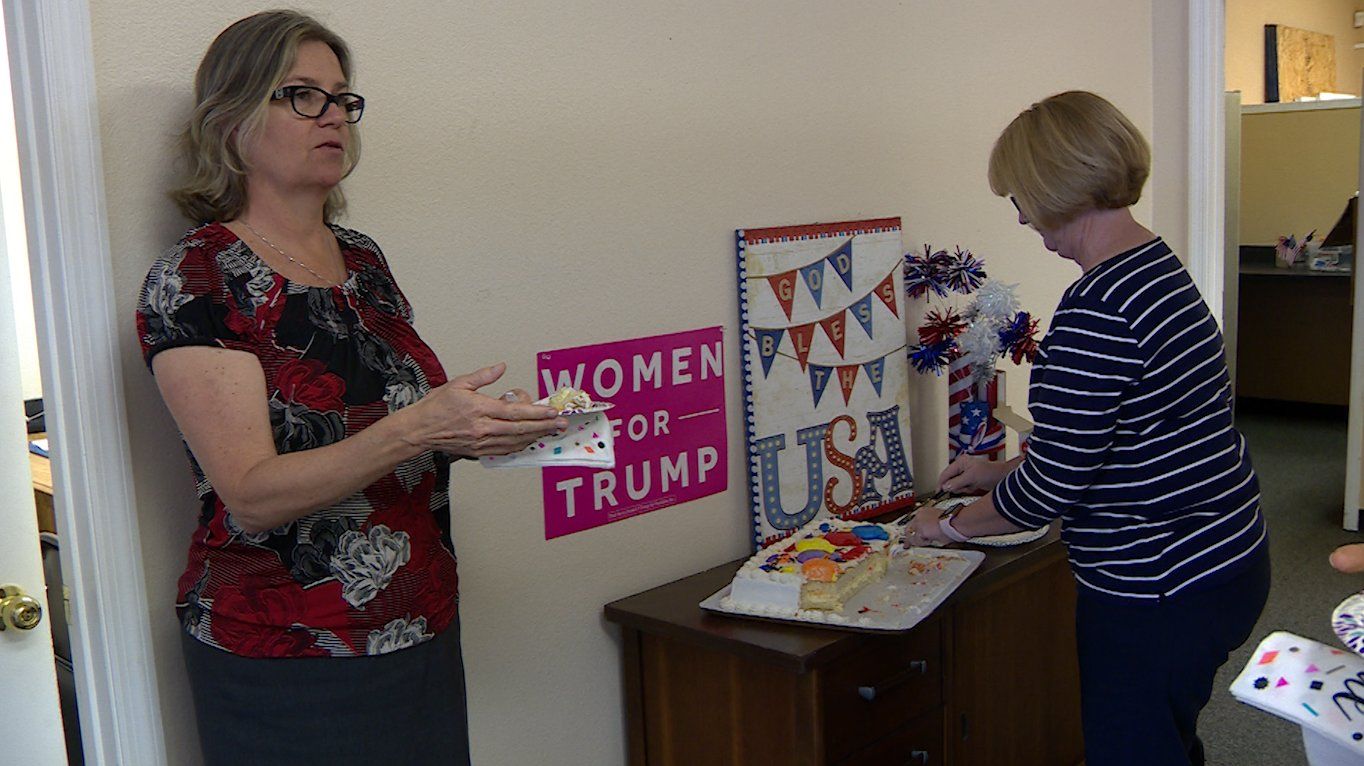 Trump campaign volunteers Linda Trocine and Hillary Courson shares cake to celebrate the president's birthday. (VOA video grab)