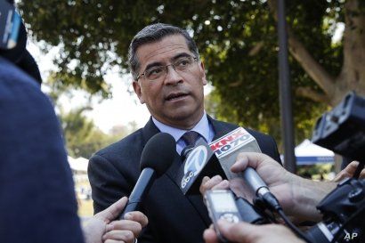 FILE - California Attorney General Xavier Becerra talks to reporters after a news conference at University of California, Los Angeles, Aug. 2, 2018.