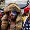 Judge allows man seen roaming Capitol in furry horn hat moved to jail with organic food