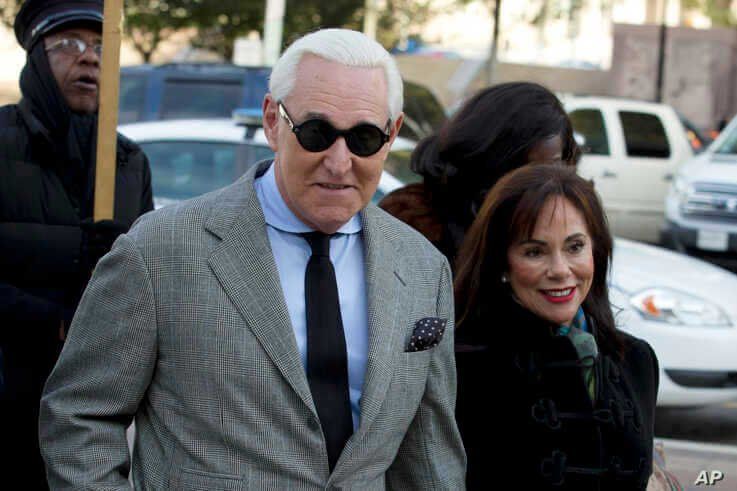 Roger Stone, accompanied by his wife Nydia Stone, arrives at federal court in Washington, Nov. 14, 2019.