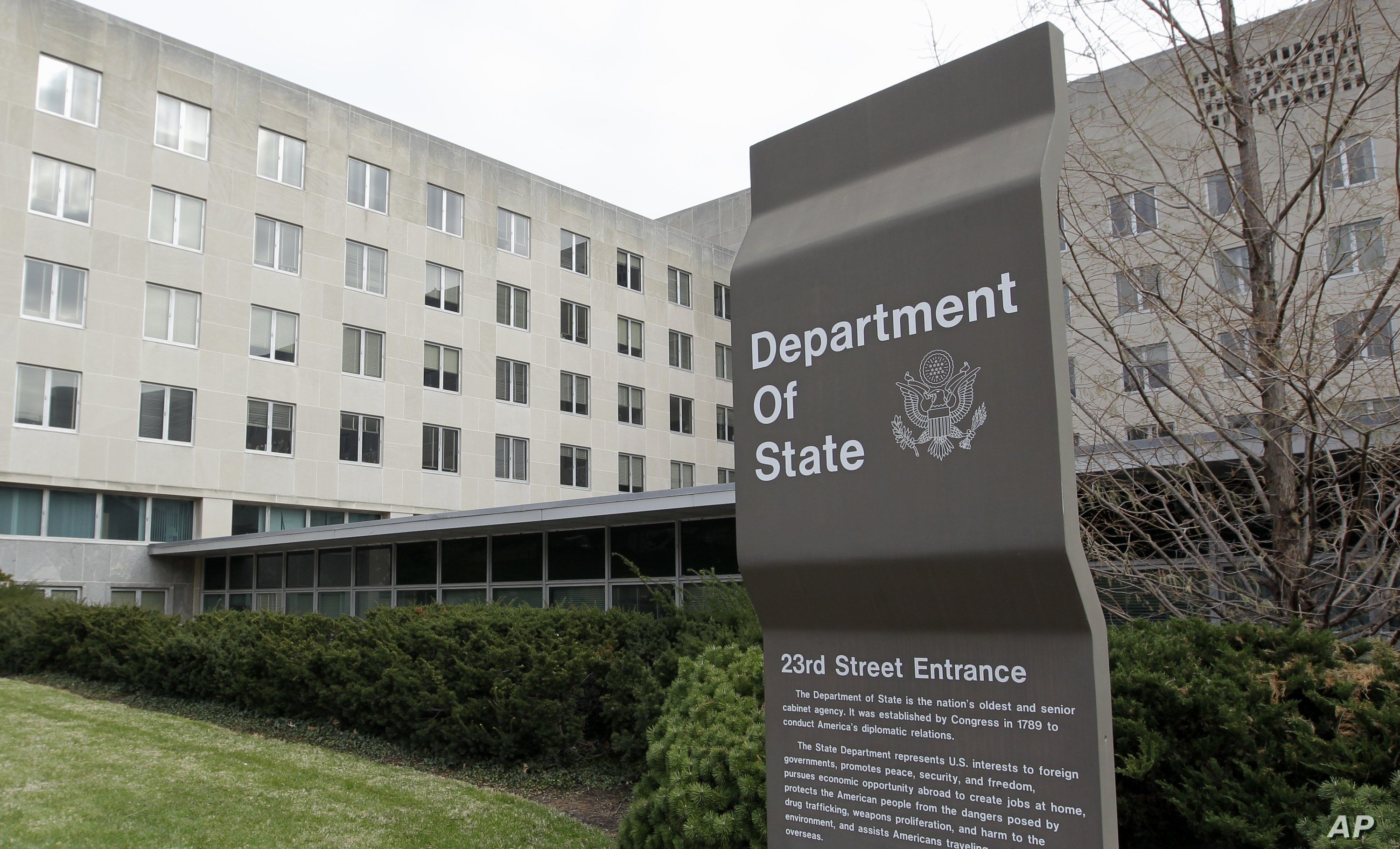 FILE - In this Dec. 15, 2014 file photo, the State Department in Washington. U.S. officials say the Trump administration is proposing deep cuts in funding for diplomacy and foreign aid to help pay for increased military spending.  (AP Photo/Luis M…