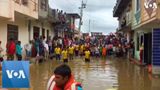 Floods Force Evacuations, Drown Buildings in Northern India