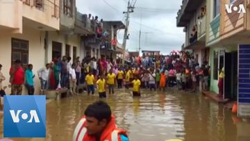 Floods Force Evacuations, Drown Buildings in Northern India