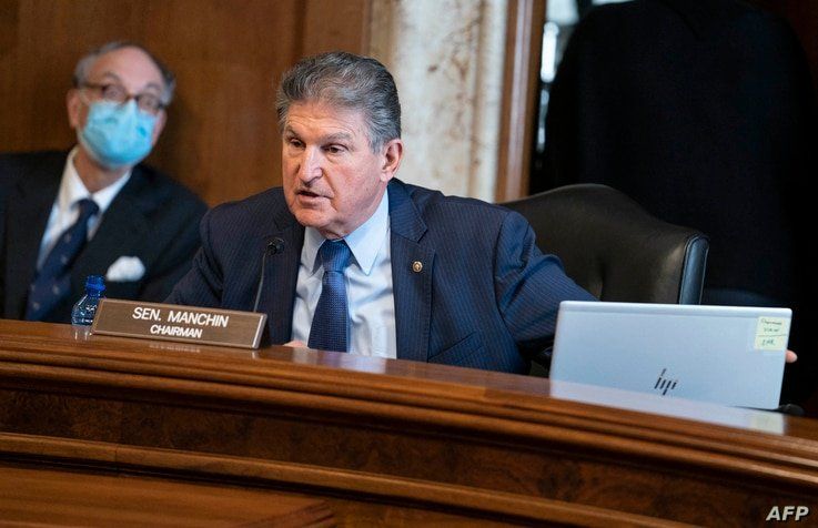 (FILES) In this file photo taken on February 24, 2021 Senator Joe Manchin, a Democrat from West Virginia and chairman of the…