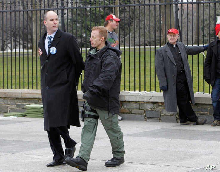 Sierra Club Executive Director Michael Brune is arrested outside the White House in Washington, Wednesday, Feb. 13, 2013, as…